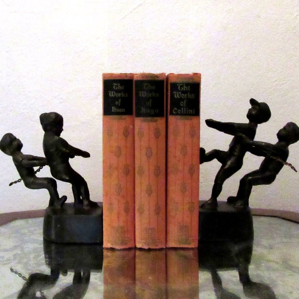 Vintage bronze bookends - children playing - "tug of war" -  bronze figurines